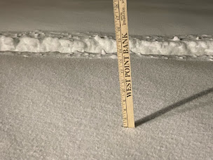 yardstick in snow measuring 6"