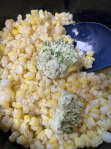 garden fresh corn with garlic scape and parsley compound butter