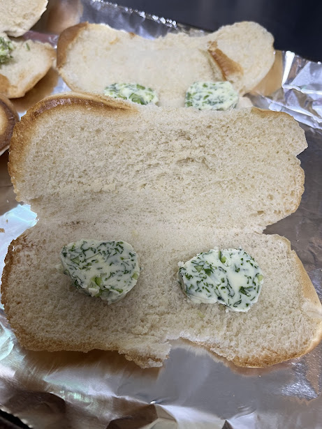 hoagie roll for homemade garlic bread using garlic scape compound butter