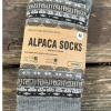 PA003 Pair of vibrant alpaca socks with colorful knit design, made from a blend of alpaca, acrylic, spandex, and nylon. USA designed, crafted in Peru, size medium fits most women.