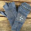 A pair of "catskills" alpaca glittens with fleece lining, featuring a convertible mitten flap over fingerless gloves for extra warmth and versatility.
