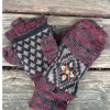 A pair of "harvest mosaic" alpaca glittens with fleece lining, featuring a convertible mitten flap over fingerless gloves for extra warmth and versatility.