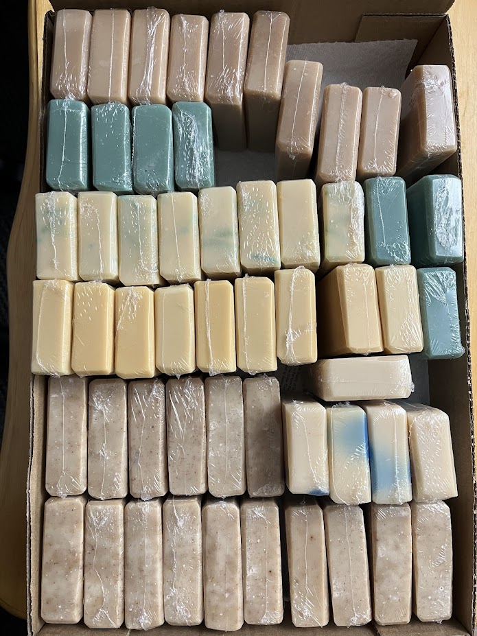 large box of soaps showing the beveled edges of our handmade soap